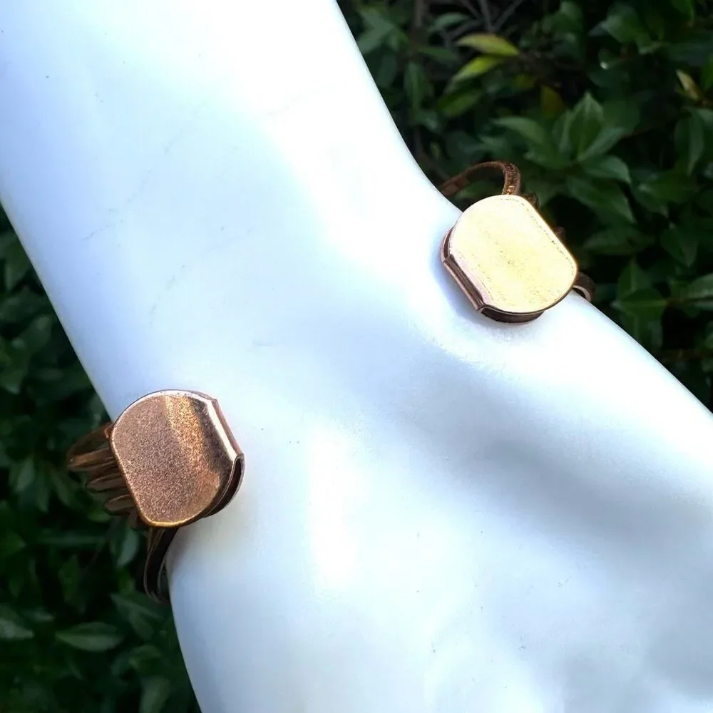 Rose gold tone twisted open cuff bracelet